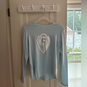 Lululemon branded blue long sleeve top.